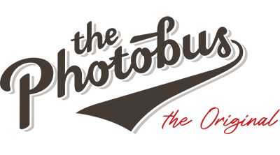 Logo with the Photobus in cursive font and the original in red italics in the bottom right, perfect for a wedding singer in Zurich or anyone celebrating special moments in Switzerland.